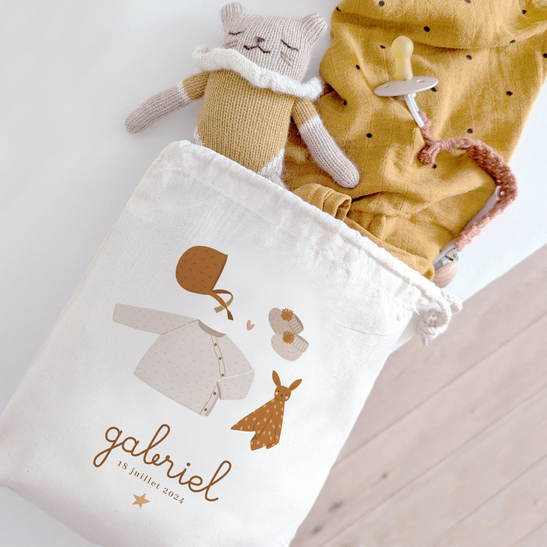Pochon de Naissance - La tenue de bébé